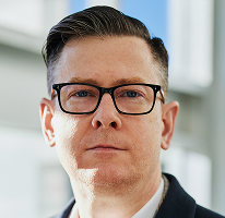 Alexander Hughes CEO-Porträt Kryptowährungshandelsunternehmen Geschäftsführer